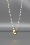 Collier menotte orné de perles