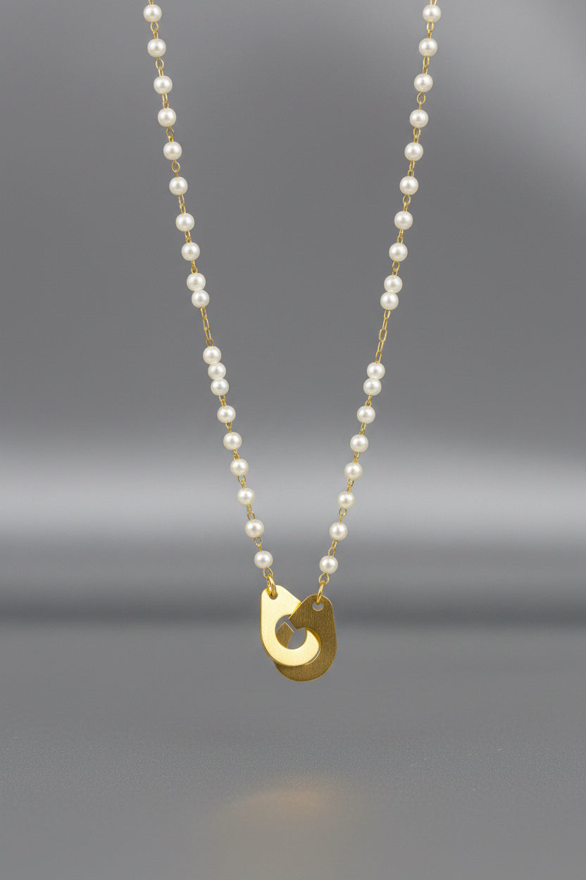 Collier menotte orné de perles