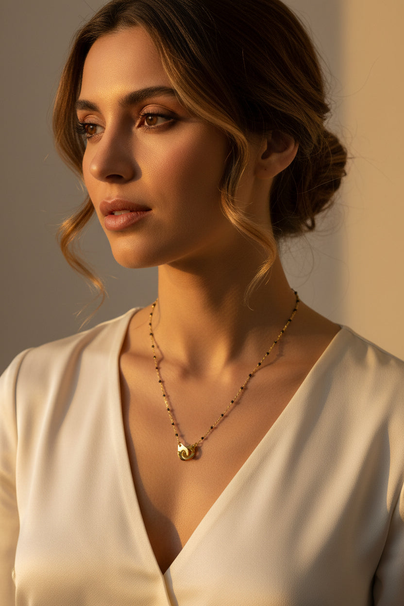collier menottes à perle d’onyx